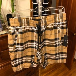 Brand new pace in plaid shorts. Sz medium
